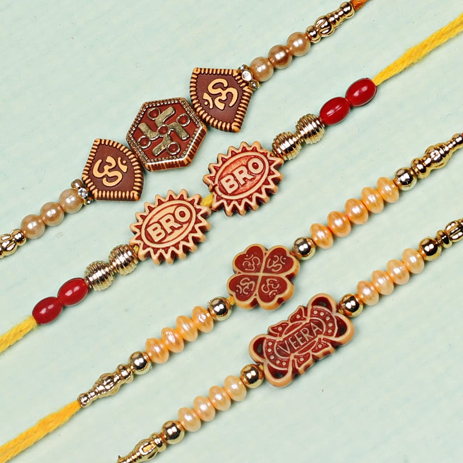 Multicolor Combo of 12 Dora Rakhi Set for Men with Roli Chawal Best Wishes 