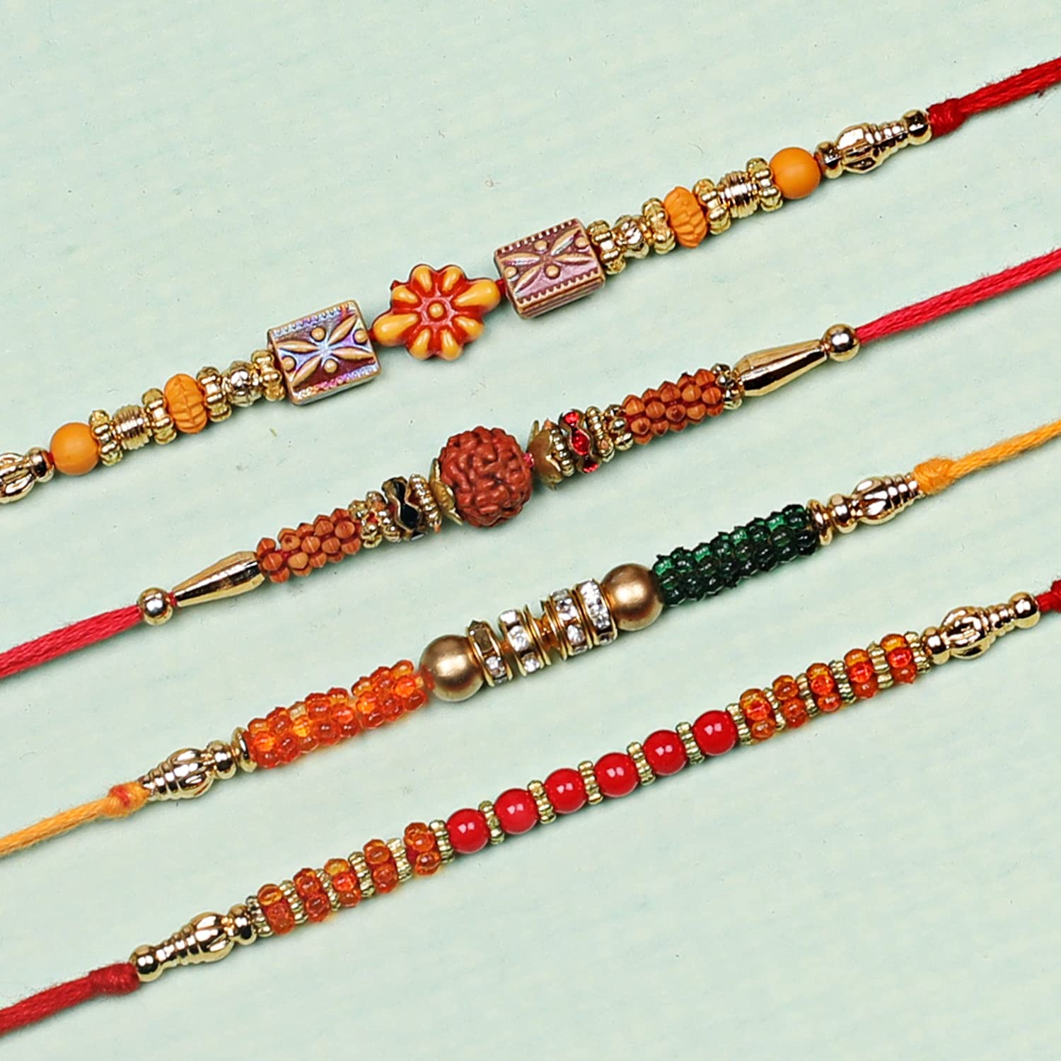 Multicolor Combo of 12 Dora Rakhi Set for Men with Roli Chawal Best Wishes 